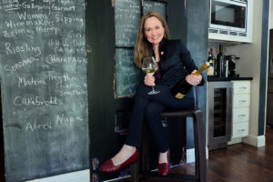 Master Sommelier Andrea Robinson at a Chalk Board